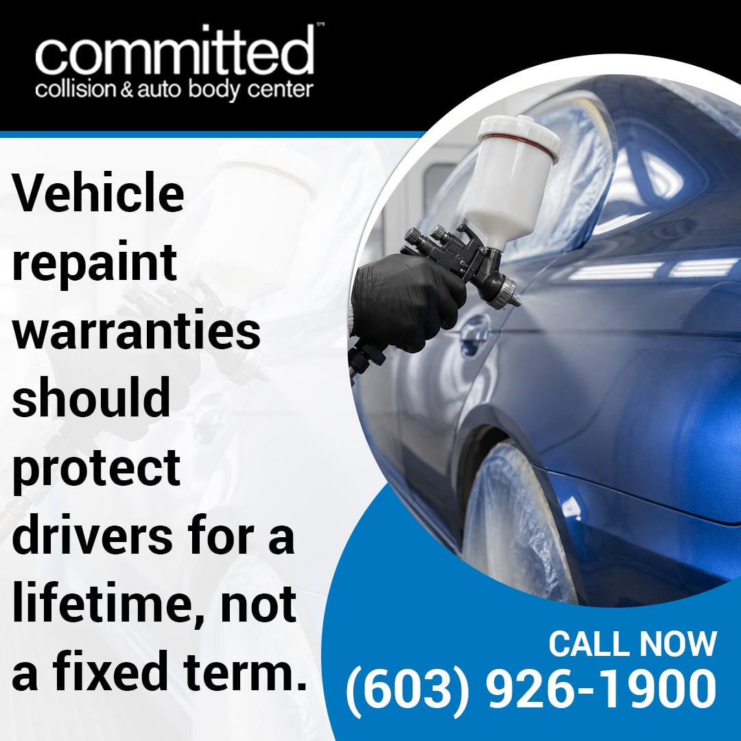 What Warranty Coverage Applies to a Repaint After Auto Body Repair? 1 A gloved auto technician using a paint spray gun to apply a fresh coat to a blue car inside a professional paint booth.