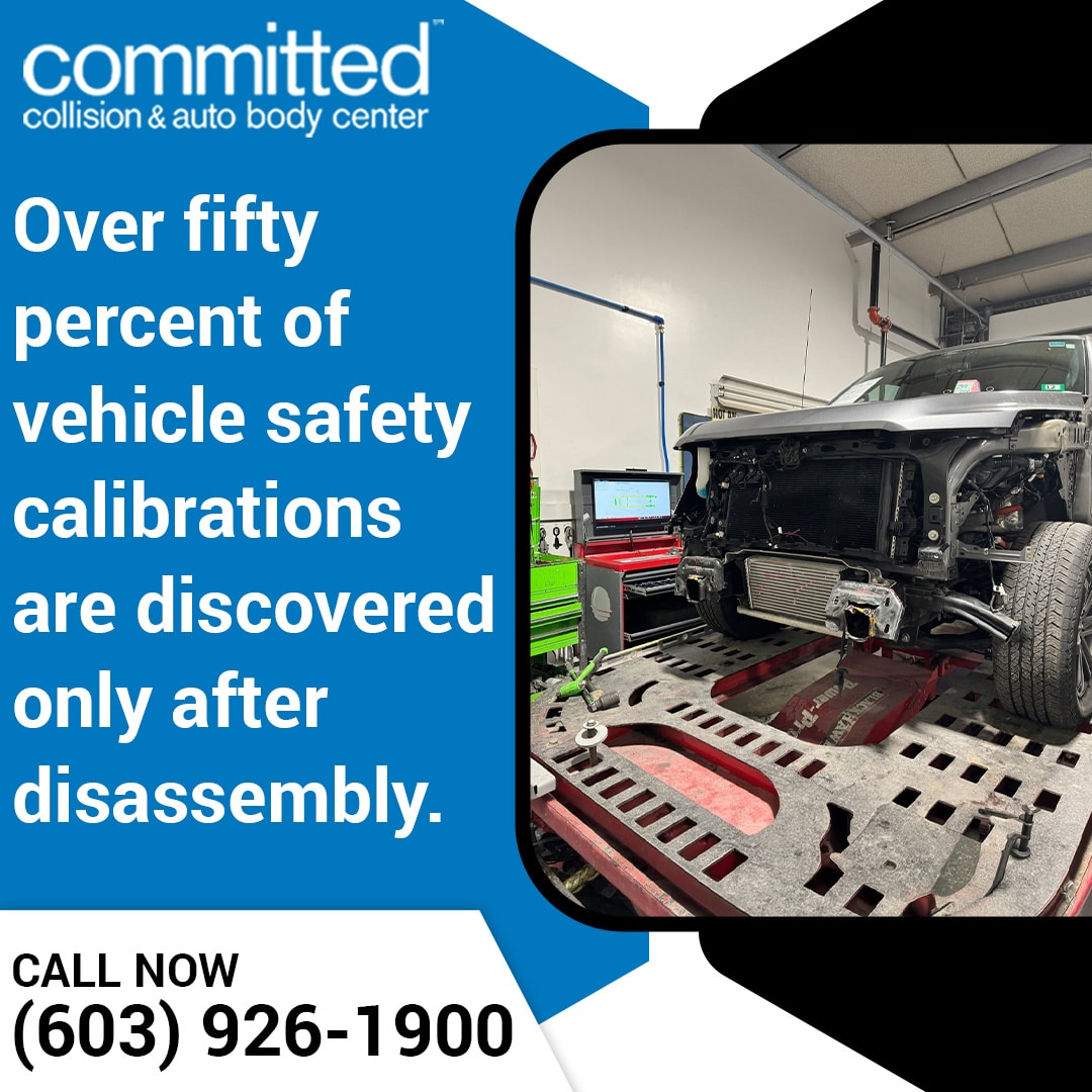 Local Auto Body Shop vs. Chain: Which Repairs Your Car Faster? 1 ront-end disassembled truck secured on a frame rack machine inside an auto body repair shop.